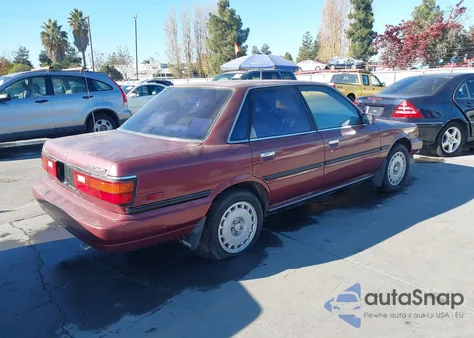1989 Toyota Camry Le z USA, uszkodzony, nr VIN JT2VV22E6K0065099